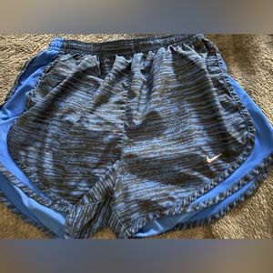 Nike: black and blue striped shorts